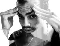 Man's face with hands