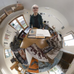 Photo of print shop with figure distorted in spiral