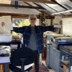 Print shop with artist in shed