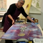Celia Herrera Rodriguez at work on ""Atopilli (Water Staff)" woman at work on large painting
