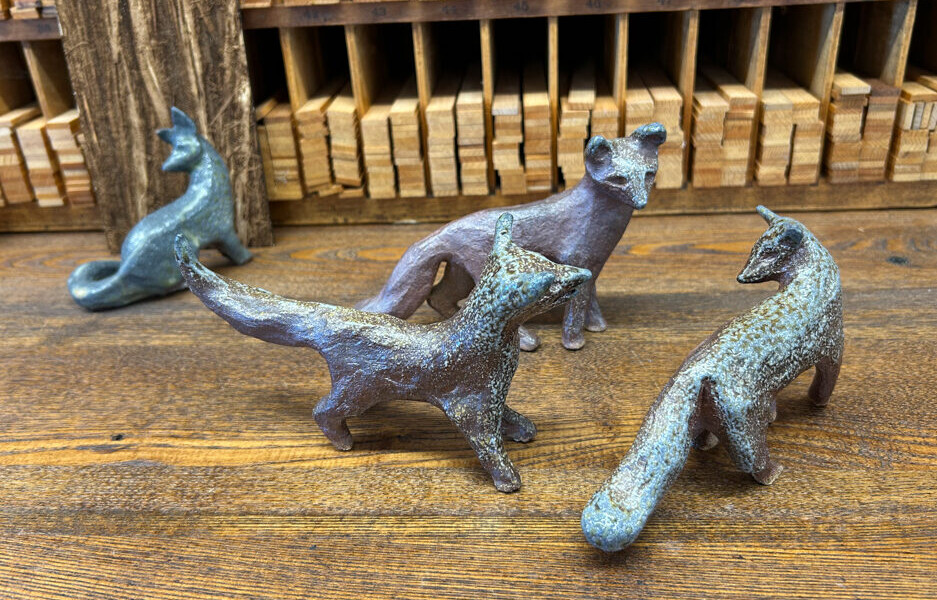 small clay fox sculptures